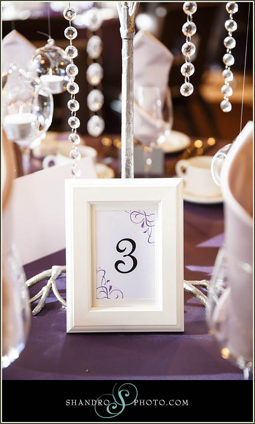 The bride DIY'd the table numbers, which perfectly commented the table decor.